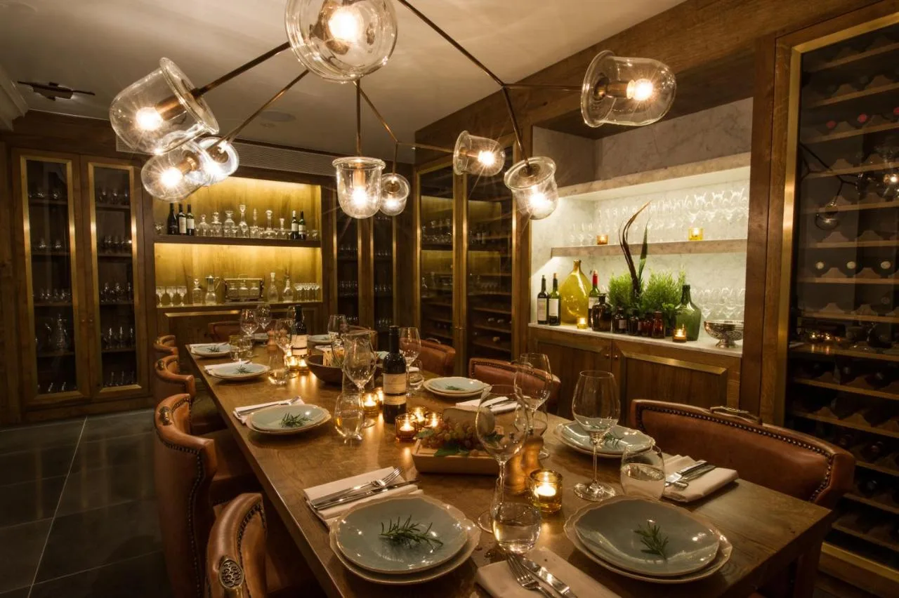 Elegant dining room with long table at The Ampersand Hotel, London